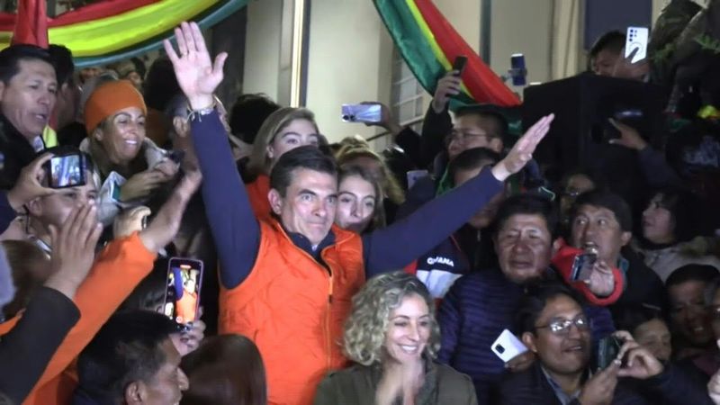 Bolivia's presidential candidate Rodrigo Paz greets supporters after first round | AFP