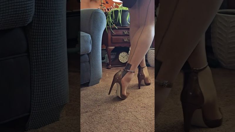 Walking in nylon fully fashioned stockings and high heels