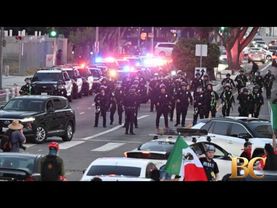 LA police make mass arrests as protesters defy overnight curfew