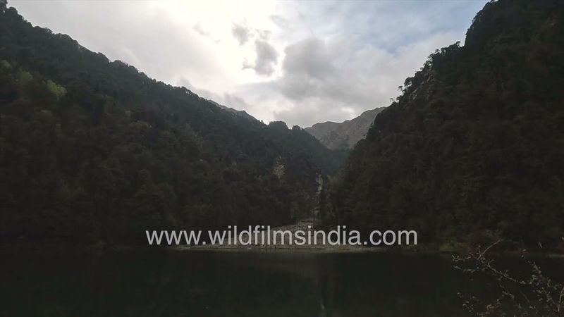 Rainy overcast day at Dodital lake, with grey clouds over Darwa Tap, high above Uttarakashi district