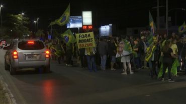 Supporters of Brazil’s ex-president Bolsonaro rally outside his home amid legal turmoil | AFP