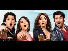 Aarti Chhabria is wearing a red dress at the premiere of her film Dhoom Dadakka at Cinemax, Versova