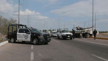 Mexican police carry out checks after 20 bodies found in cartel bastion | AFP