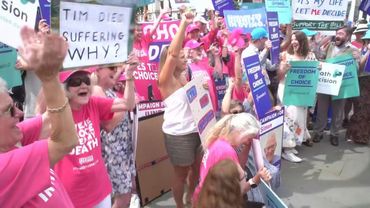 Supporters of assisted dying bill cheer outside parliament as MPs vote in favour | AFP