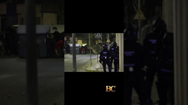 Police detain 8 people after anti-migrant clashes in Spanish town