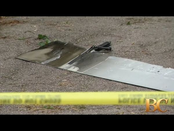 Flap falls from Delta plane, lands in driveway