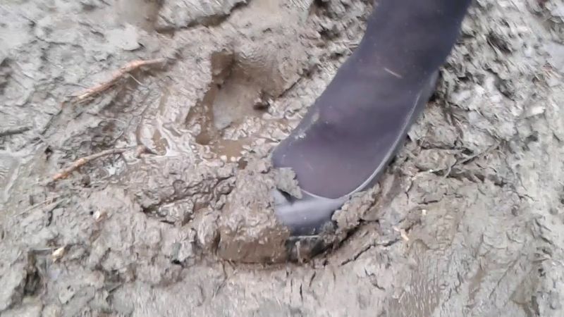 high heels in deep mud