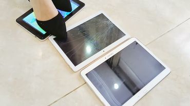 ​Girl Stomping on a Tablet​