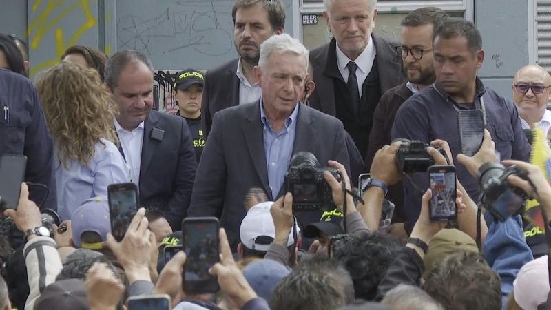 Colombia ex-president appears at memorial site for Miguel Uribe | AFP