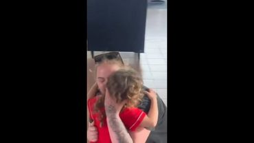 Young girl reunited with mum after being separated by floods