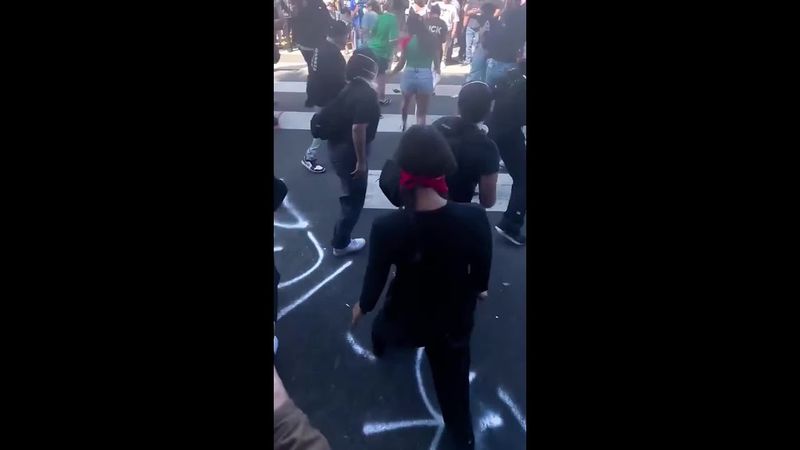 Protesters perform line dance during anti-ICE demonstrations