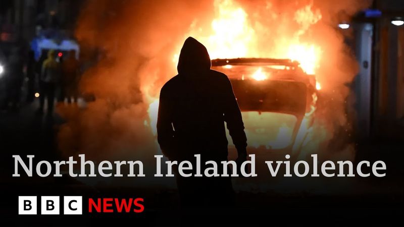 Anti-migrant riots spread in Northern Ireland as mobs attack police | BBC News