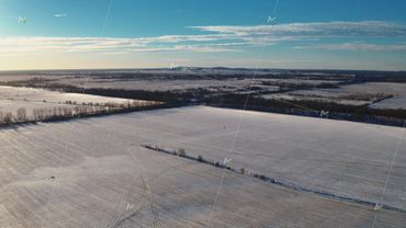 Flight over winter fields and forests in the suburbs of St. Petersburg 43
