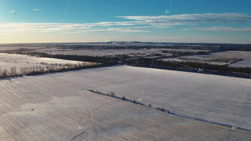 Flight over winter fields and forests in the suburbs of St. Petersburg 43