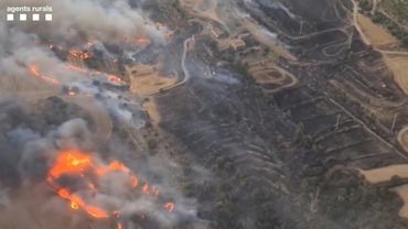 Wildfire killing two rages in Spain | AFP