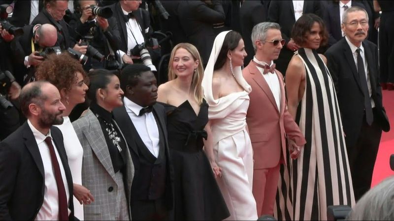 The jury of the 78th cannes film festival arrive on the red carpet for opening ceremony | AFP