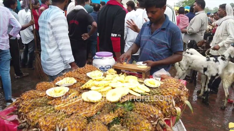 Crowd in the market during the Bakrid festival goats and fruits are being sold near Jama Masjid