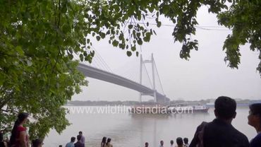Comfortable Houseboat cruises down the second Hooghly bridge, Yellow Ambassador Taxis in Kolkata