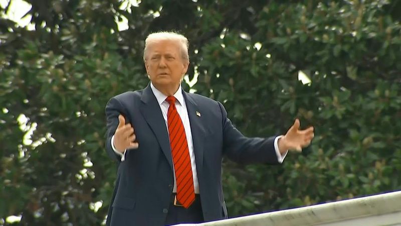 Trump surveys White House grounds from rooftop | AFP