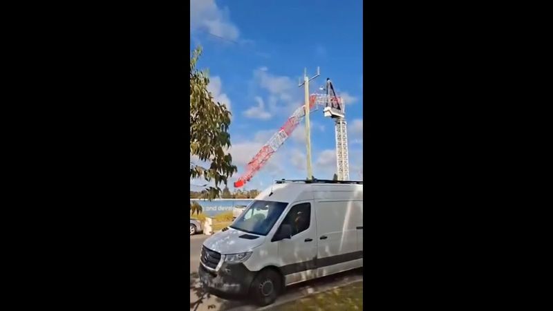 Dramatic moment Melbourne crane topples in wild winds