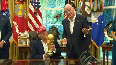 Trump holds World Cup trophy as 2026 draw set for US capital | AFP