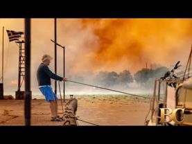 Homes burn in Greece as wildfire sweeps through coastal towns