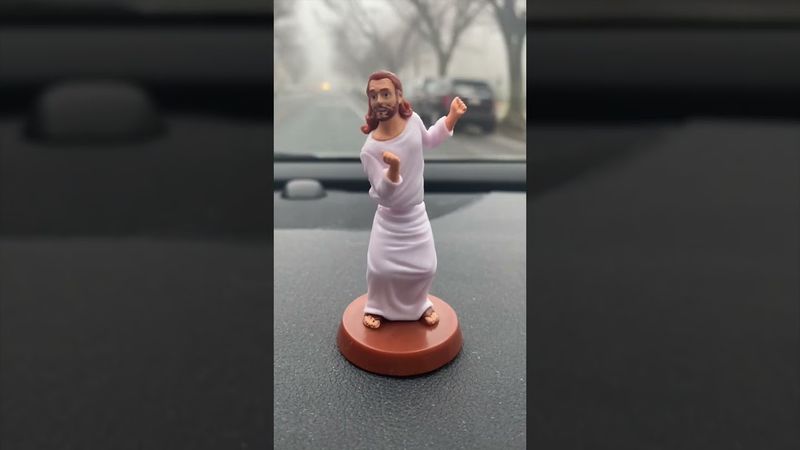Plastic Jesus Riding on the Dashboard of my Car