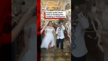 Couple walk down flooded aisle to get married. #BBCNews