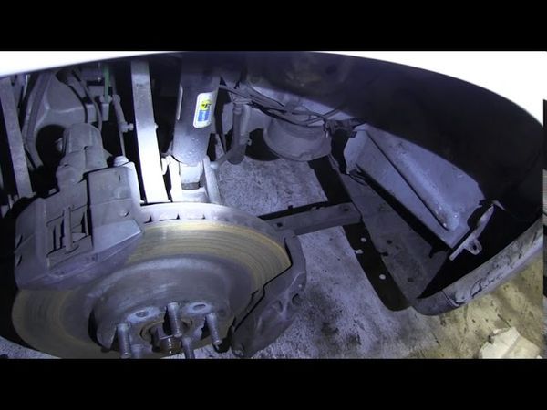 Ремонт и разборка авто Тесла. Как снять пневмоподушку электрокара Tesla Model S.