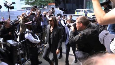 Comedian Russell Brand arrives in London court over rape charges | AFP