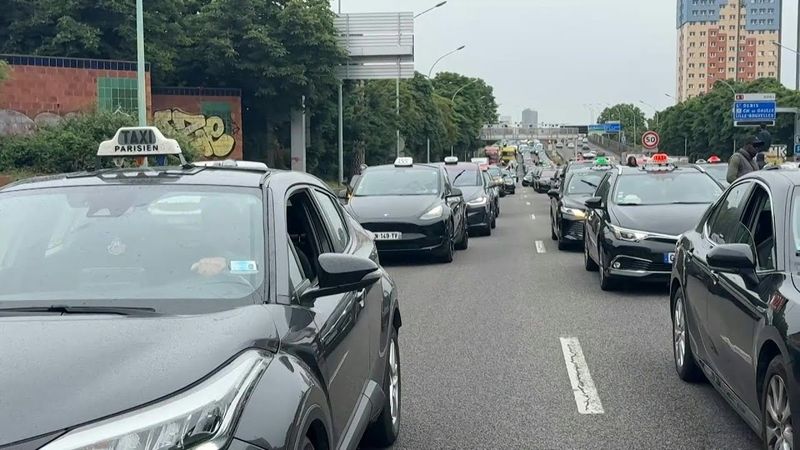 Paris taxi drivers stage go-slow protest over medical transport reforms | AFP