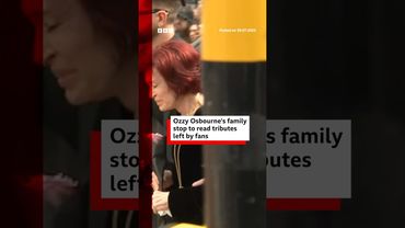 Ozzy Osbourne's family stop to read tributes in Birmingham. #OzzyOsbourne #BBCNews