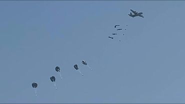 Plane drops humanitarian aid over northern Gaza Strip | AFP