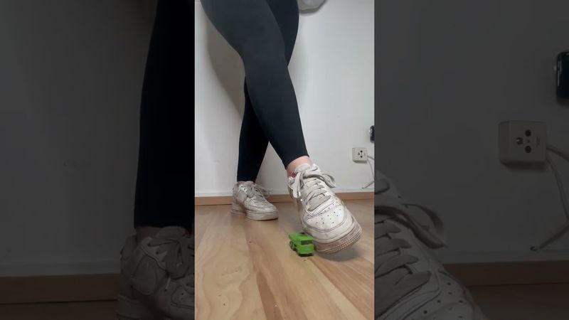 Girl crushing toy cars 2