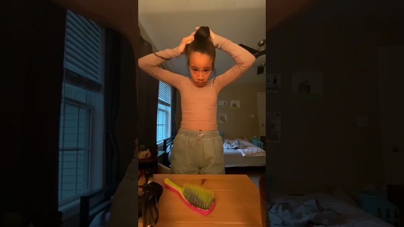 Doing my hair in the outfit that you chose ￼