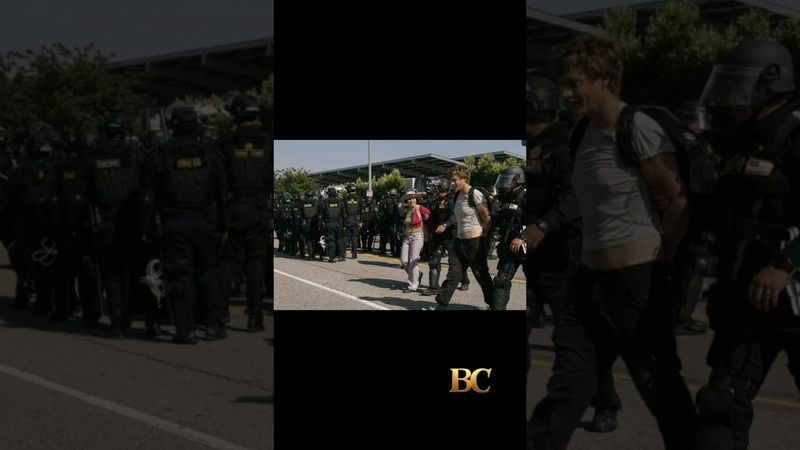 LA police make mass arrests as protesters defy overnight curfew