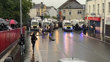 Tensions flare in N.Ireland town as anti-immigration unrest spreads | AFP