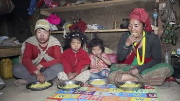 Cooking and eating together  in village kitchen || Nepali village