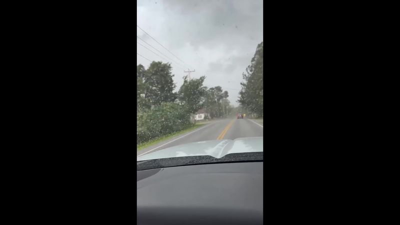 Terrifying moment severe storm rips off roof, nearly hitting driver