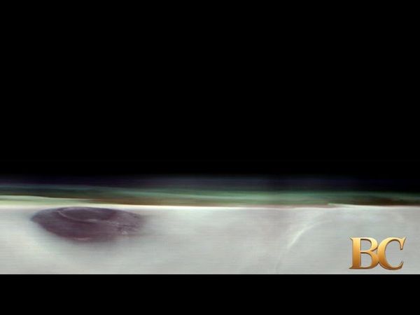 Mars volcano twice as big as Earth’s tallest one seen poking through clouds