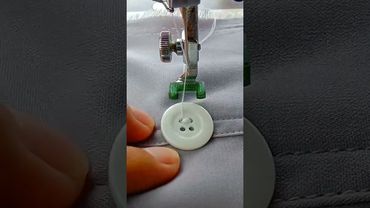sewing buttons using a sewing machine #sewing