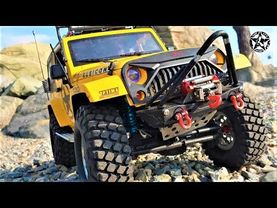 RC Car MST CFX Jeep Rubicon Rocks on the Seashore