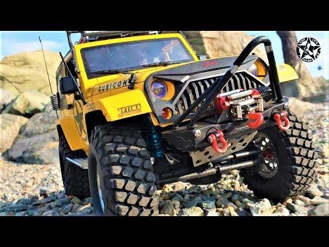 RC Car MST CFX Jeep Rubicon Rocks on the Seashore
