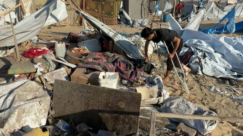 'Every household bears a deep wound,' says displaced Gazan at site of Israeli strike | AFP