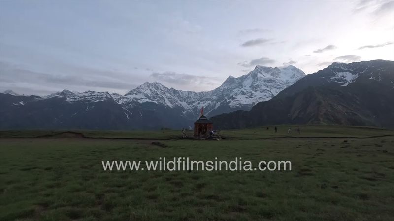 Chaukhamba dominates small temple at Budha Madmaheshwar of the Panch Kedar in Uttarakhand