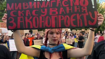 People gather in Kyiv to protest against law curbing anti-graft agencies | AFP