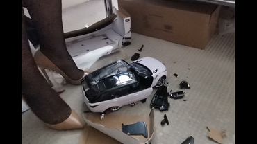 Crushing brand new toy car in Louboutin heels