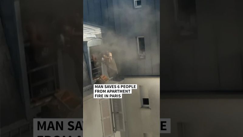Man saves six people from apartment fire in Paris | AFP #shorts
