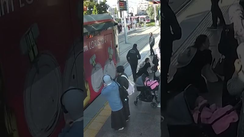 Un guardia de seguridad salva a una mujer de ser atropellada por un tranvía