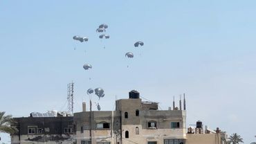 Plane drops aid packages over central Gaza camps | AFP